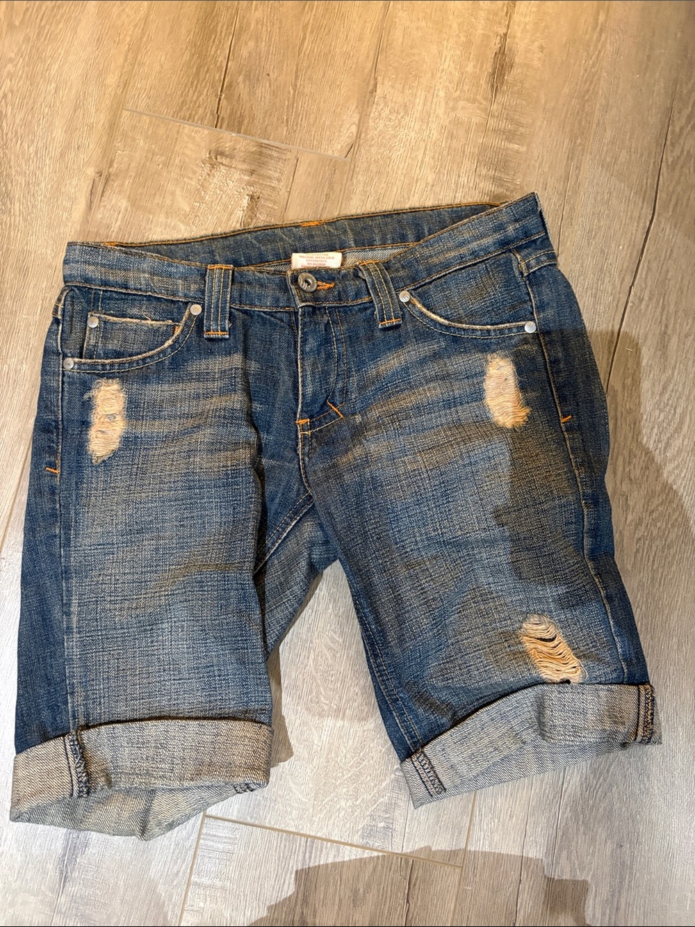 Women’s Distressed Mid-Blue Denim Bermuda Shorts